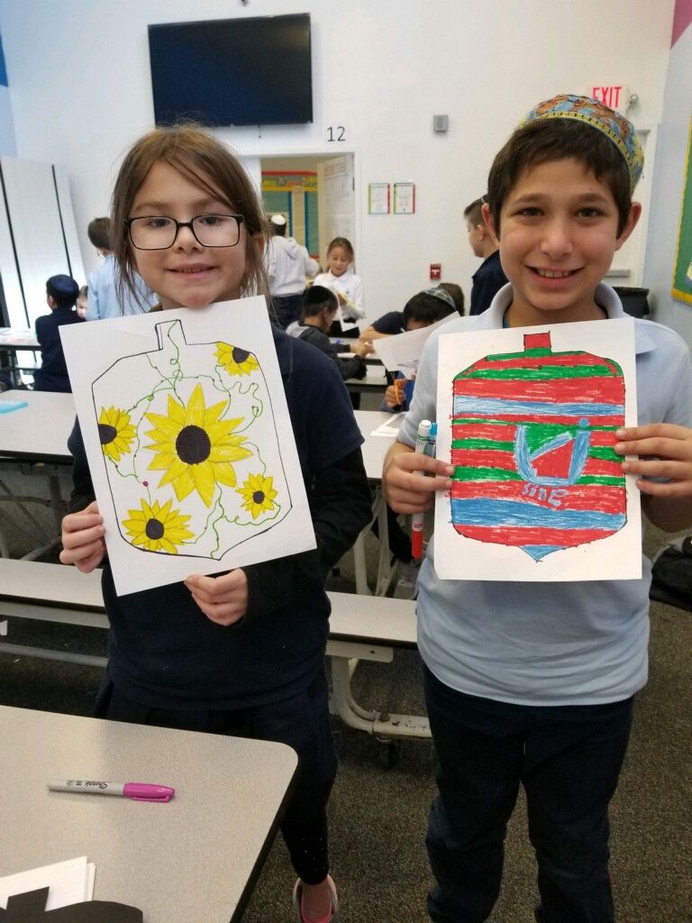 Students with artwork