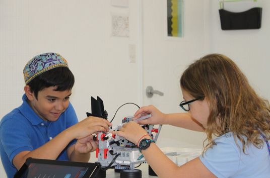 Student with robot
